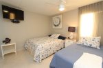 Guest Bedroom  Features 1 Queen Size Bed & 1 Twin Bed